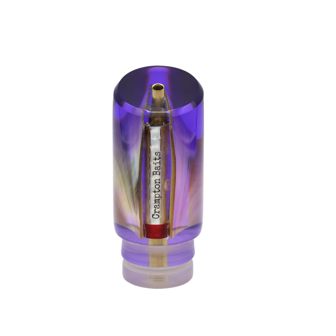 Señuelo para pesca deportiva y señuelo de troleo Crampton Baits. Modelo Quarter Toner en color Morado y concha crema. Marea Alta (mareaalta.mx) único distribuidor de Crampton Baits en México.
