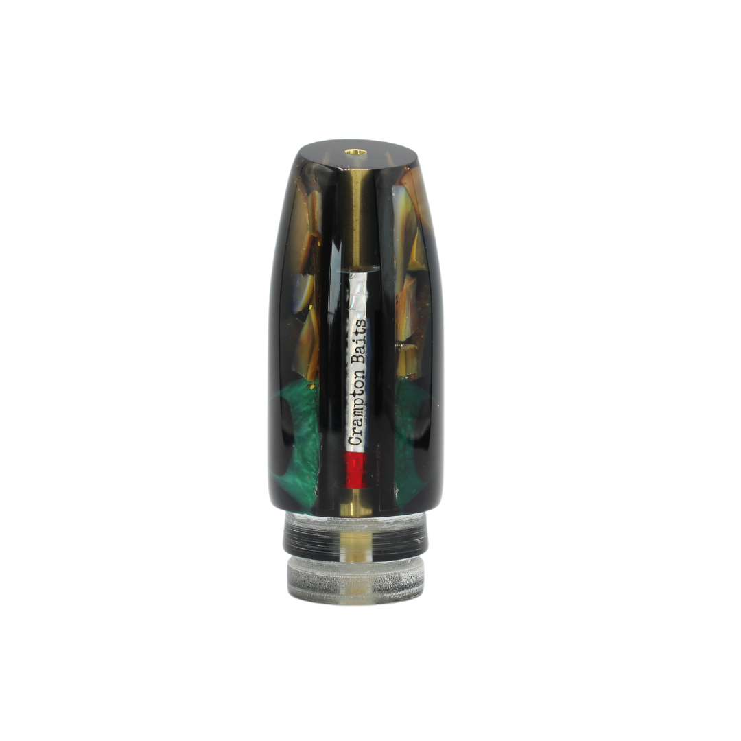 Señuelo para pesca deportiva y señuelo de troleo Crampton Baits. Modelo Plunger en color Negro y concha crema cracked. Marea Alta (mareaalta.mx) único distribuidor de Crampton Baits en México.