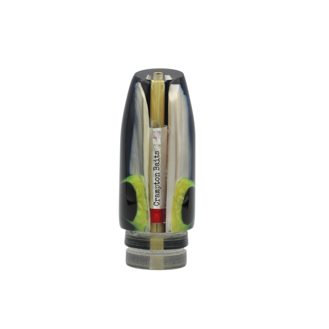Señuelo para pesca deportiva y señuelo de troleo Crampton Baits. Modelo Plunger en color Negro y concha blanca. Marea Alta (mareaalta.mx) único distribuidor de Crampton Baits en México.